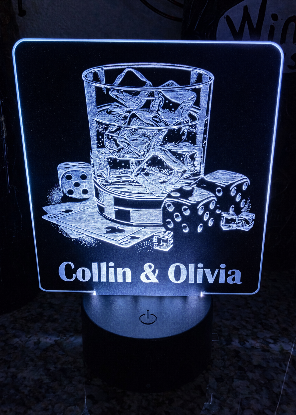 Laser engraved black acrylic with whiskey glass, cards, and dice
