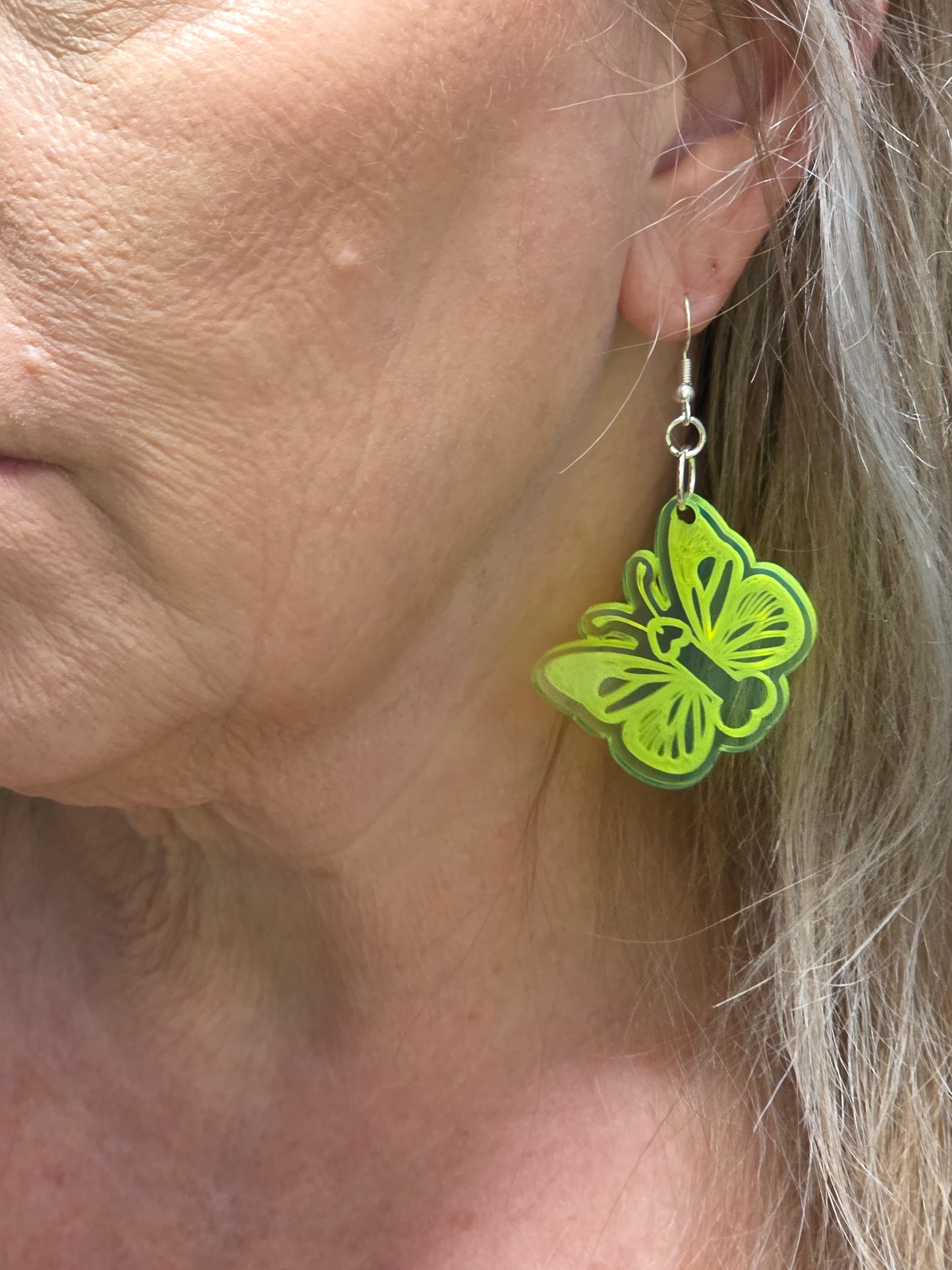 🌟 Glow Wild: Butterfly Dangle Earrings